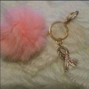 Beautiful pink puff ball with pink key